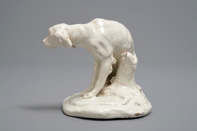 A white Dutch Delft model of a dog, 18th C.