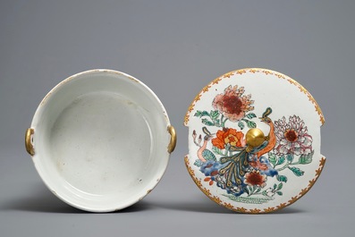 A polychrome petit feu and gilded Dutch Delft famille rose-style butter tub, 18th C.