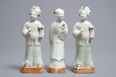 Three Chinese white- and celadon glazed biscuit figures, Qianlong