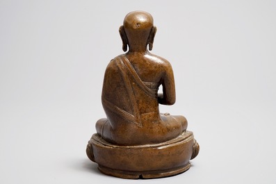 A Tibetan bronze figure of Buddha, 18/19th C.