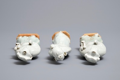 Three Chinese white- and celadon glazed biscuit figures, Qianlong