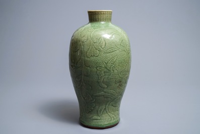 A Chinese Longquan celadon meiping vase with underglaze design, Ming