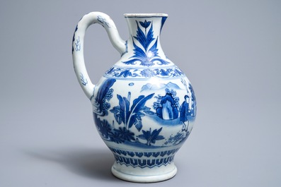 A Chinese blue and white jug with figures in a landscape, Transitional period