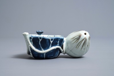 A Chinese underglaze blue and copper-red 'crab and lotus' water dropper, Kangxi