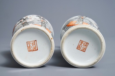 A pair of Chinese iron red, grisaille and gilt vases, Hongxian mark, 20th C.