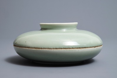 A round Chinese celadon compartmented bowl and cover, Qianlong mark, 19th C.