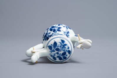 A Chinese blue and white jug and cover after a pewter example, Kangxi