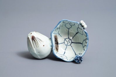 A Chinese underglaze blue and copper-red 'crab and lotus' water dropper, Kangxi