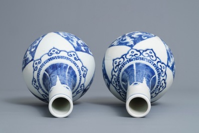 A pair of Chinese blue and white bottle vases, Kangxi mark, 19/20th C.