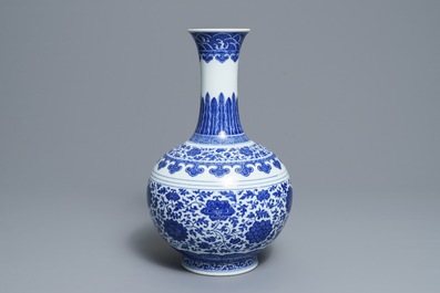 A Chinese blue and white Ming style bottle vase, Qianlong mark, 19/20th C.