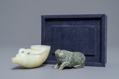 A Chinese jade deer rhyton cup and a spinach green jade pig, Han or later