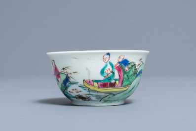 A fine Chinese famille rose cup and saucer with a river scene, Yongzheng