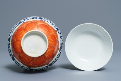 A Chinese blue, white and iron red bowl and cover on stand, Qianlong/Jiaqing