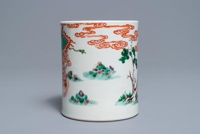 A Chinese famille verte brush pot on wooden stand, Kangxi