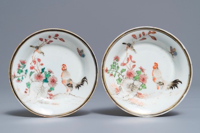 A pair of Chinese famille rose saucers and a milk jug with roosters, Yongzheng