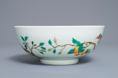 A Chinese famille verte 'birds on peach branches' bowl, Kangxi mark, 19th C.