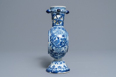 A large Dutch Delft blue and white ring-form puzzle jug, 1st quarter 18th C.
