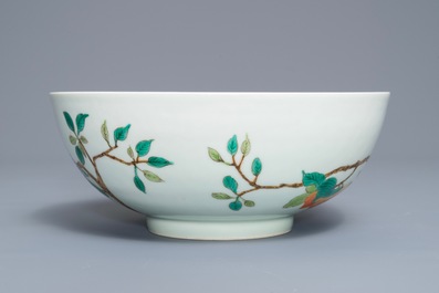 A Chinese famille verte 'birds on peach branches' bowl, Kangxi mark, 19th C.