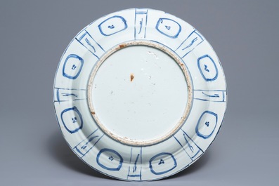 A Chinese blue and white kraak porcelain dish with birds near a rock, Wanli