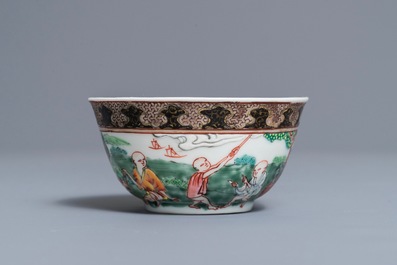 A fine Chinese famille rose 'apple pickers' cup and saucer, Yongzheng