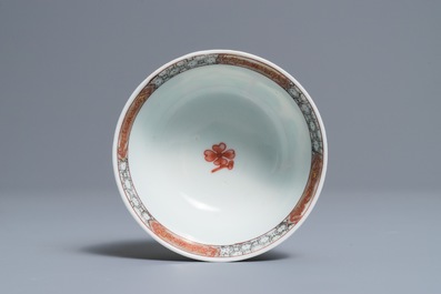 A fine Chinese famille rose 'apple pickers' cup and saucer, Yongzheng