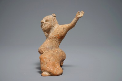 A Chinese pottery figure of a male dancer, Han