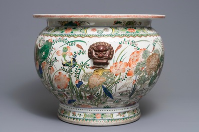 A Chinese famille verte fish bowl with birds among flowers, 19/20th C.