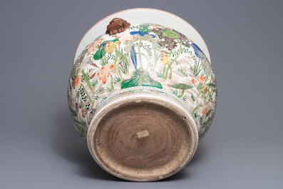 A Chinese famille verte fish bowl with birds among flowers, 19/20th C.