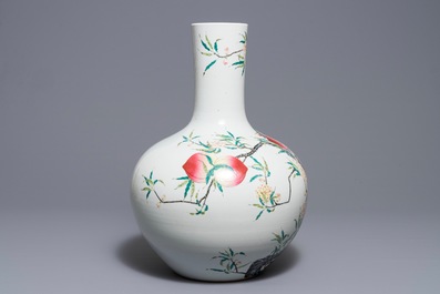 A Chinese famille rose &lsquo;nine peaches&rsquo; tianqiu ping vase, Qianlong mark, 20th C.
