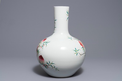 A Chinese famille rose &lsquo;nine peaches&rsquo; tianqiu ping vase, Qianlong mark, 20th C.