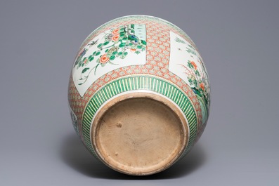 A Chinese famille verte fish bowl with birds among flowers, 19th C.