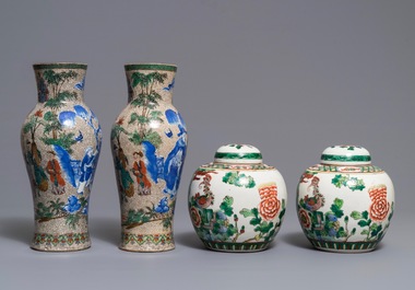 A pair of Chinese famille verte vases and a pair of covered jars, 19th C.