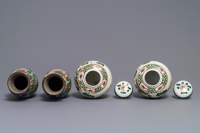 A pair of Chinese famille verte vases and a pair of covered jars, 19th C.