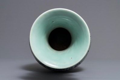 A Chinese blue and white on celadon ground 'buddhist emblems' vase, Qianlong mark and of the period