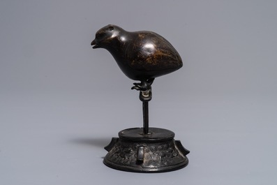 A Chinese bronze water dropper in the shape of a perched bird, Ming