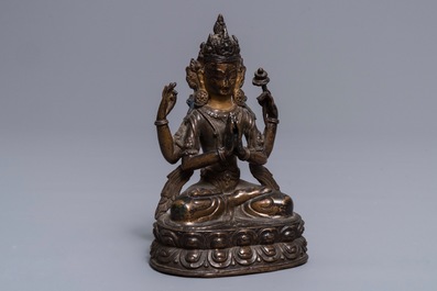 A Sino-Tibetan gilt bronze figure of the four-armed Avalokiteshvara, 18th C.