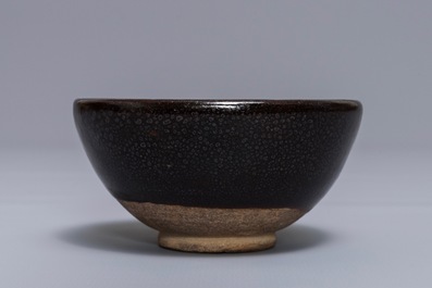 A Chinese black-glazed tea bowl with oil spots, Song or later