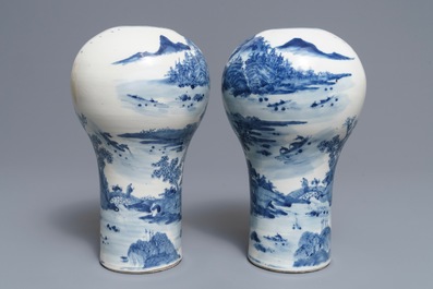 A pair of Chinese blue and white landscape vases, 19/20th C.