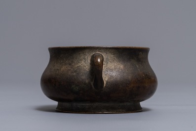 A Chinese gold-splashed bronze incense burner, Xuande mark, 18th C.