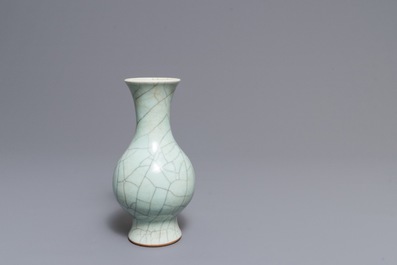 A Chinese celadon crackle-glazed vase and a famille verte vase, 19th C.