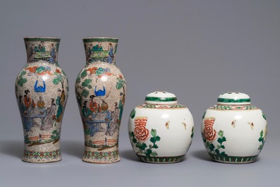 A pair of Chinese famille verte vases and a pair of covered jars, 19th C.