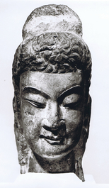 A Chinese carved limestone head of Buddha, Northern Wei (386-535)