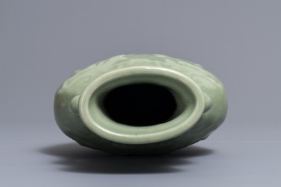 A Chinese Longquan celadon 'dragon' vase, Ming