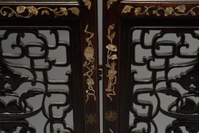 A Chinese mother-of-pearl inlaid wooden screen with silk paintings, 19th C.