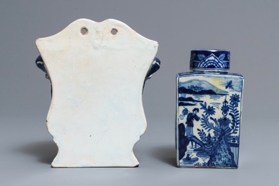 A Delft-style blue and white covered tea caddy and a wall vase, France, 19th C.