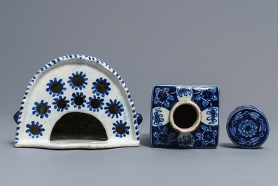 A Delft-style blue and white covered tea caddy and a wall vase, France, 19th C.