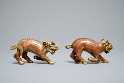 A pair of Chinese cloisonn&eacute; and gilt bronze models of qilins, Qianlong