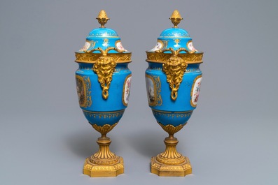 A pair of S&egrave;vres-style 'bleu c&eacute;leste' ormolu-mounted vases and covers, France, 19th C.