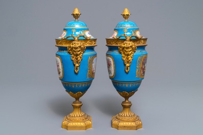 A pair of S&egrave;vres-style 'bleu c&eacute;leste' ormolu-mounted vases and covers, France, 19th C.