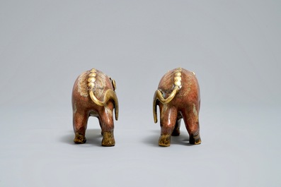 A pair of Chinese cloisonn&eacute; and gilt bronze models of qilins, Qianlong